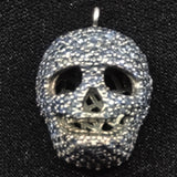 Blue sapphire skull pendant