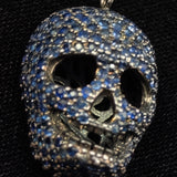 Blue sapphire skull pendant