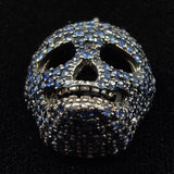 Blue sapphire skull pendant