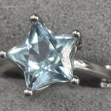 Topaz star earrings
