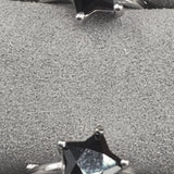 Black spinel star earrings