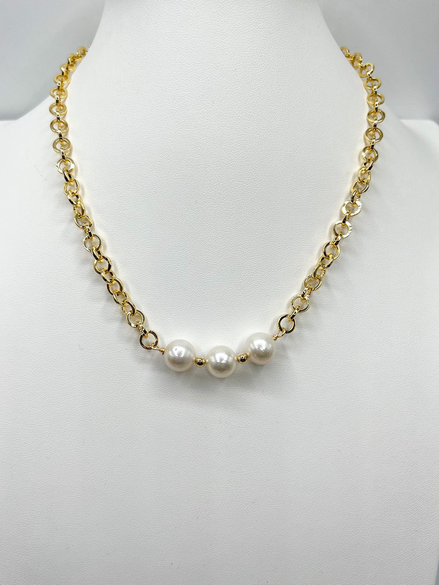 Three pearl necklace